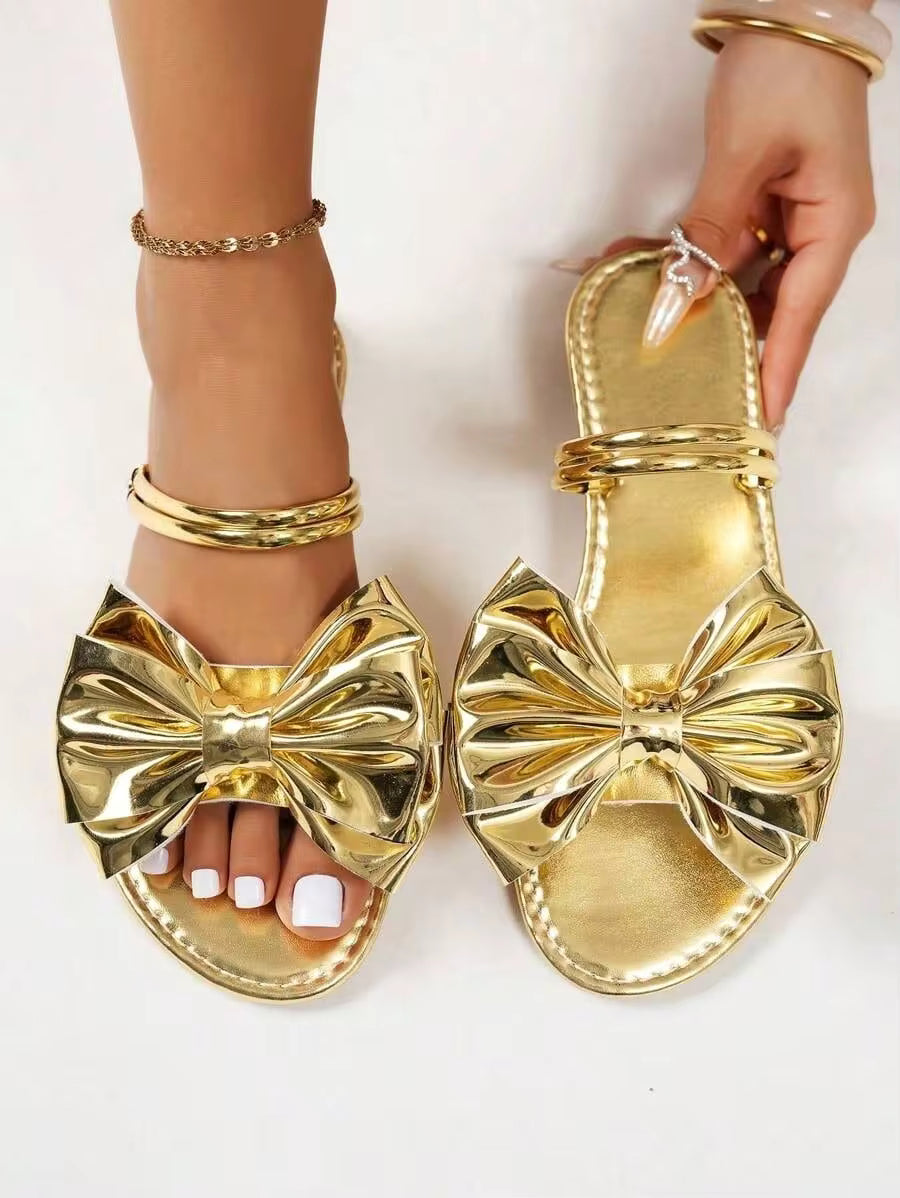 Breezelady Women's Gold Metallic Big Bow Slide Sandals, Dual Thin Straps Open-Toe Slip-On Flat Sandals For Party Club Summer Daily Outfits
